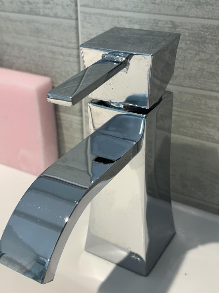 A gleaming polished chrome tap