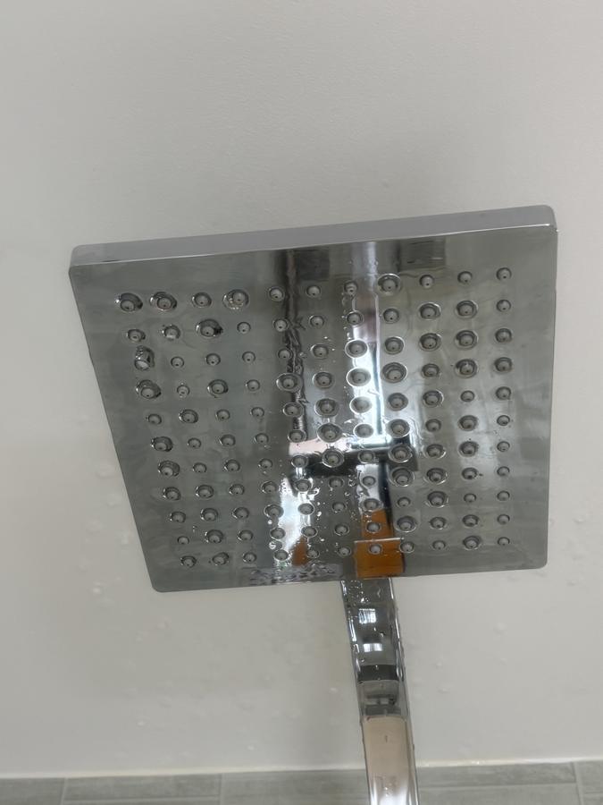 A gleaming, limescale-free shower head
